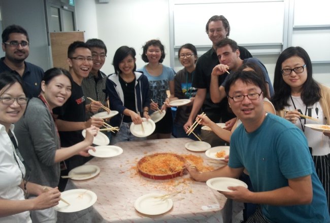Members of the Cheah lab celebrating Chinese New Year with yusheng. Credit: Lynette Cheah.