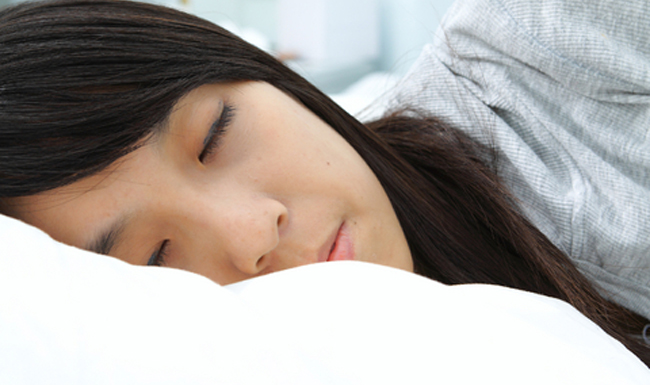 Mind 3 Asian woman sleeping dreaming bed tired dreamstime_xs_16609902